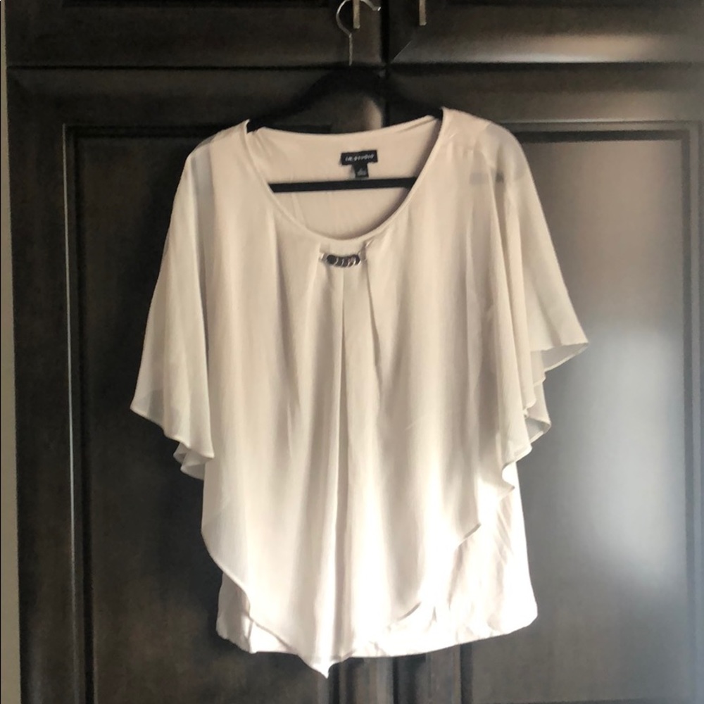 Short flutter sleeved Drape top with silver neckline detail. NWOT